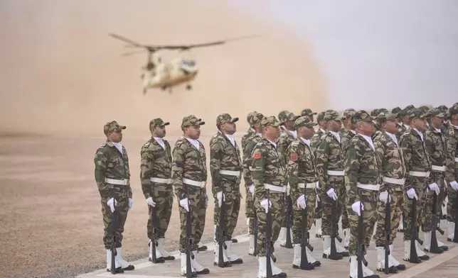Members of the Moroccan Royal Armed Forces stand guard as they take part in the 21st edition of the African Lion military exercise, in Tantan, south of Agadir, Morocco, Friday, May 23, 2025. (AP Photo/Mosa'ab Elshamy)