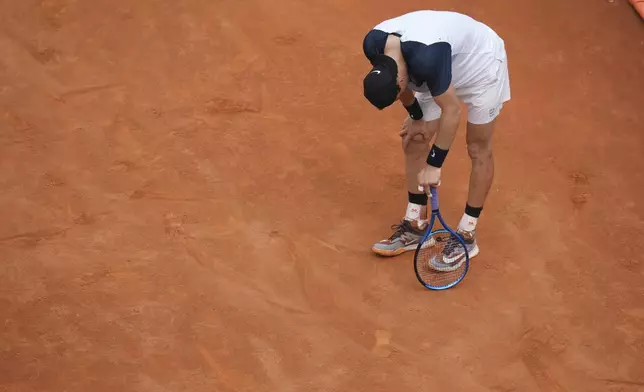 Britain's Jack Draper reacts during after loosing a point during his quarter-final tennis match against Spain's Carlos Alcaraz at the Italian Open at the Foro Italico, in Rome, Wednesday, May 14, 2025.(AP Photo/Alessandra Tarantino)