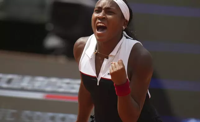 United States' Coco Gauff celebrates after defeating Mirra Andreeva in their tennis match at the Italian Open at the Foro Italico, in Rome, Wednesday, May 14, 2025.(AP Photo/Alessandra Tarantino)