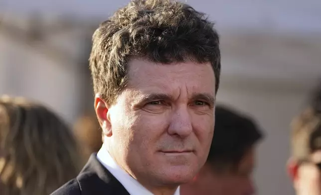 Presidential candidate Nicusor Dan attends an electoral rally a week ahead of the second round of the country's presidential election redo in Bucharest, Romania, Sunday, May 11, 2025. (AP Photo/Andreea Alexandru)