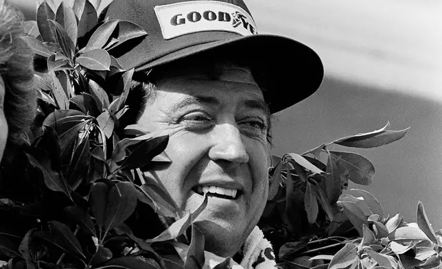 FILE - Driver Harry Gant of Taylorville, N.C., smiles during after his winning the Like Cola 500 auto race at Pocono International Raceway in Long Pond, Pa., on Sunday, July 23, 1984. (AP Photo/Falk, File)