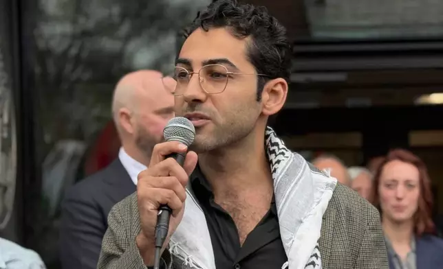 Mohsen Mahdawi speaks outside the courthouse after a judge released the Palestinian student activist on Wednesday, April 30, 2025 in Burlington, Vt. (AP Photo/Amanda Swinhart)
