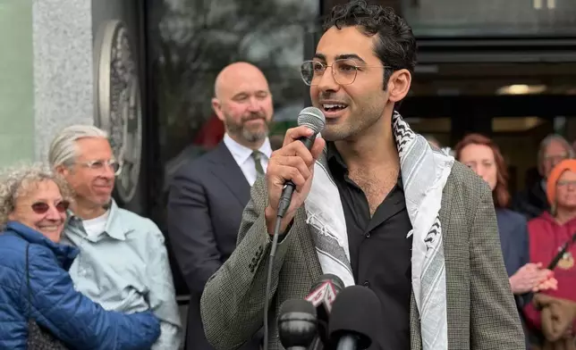 Mohsen Mahdawi speaks outside the courthouse after a judge released the Palestinian student activist on Wednesday, April 30, 2025 in Burlington, Vt. (AP Photo/Amanda Swinhart)