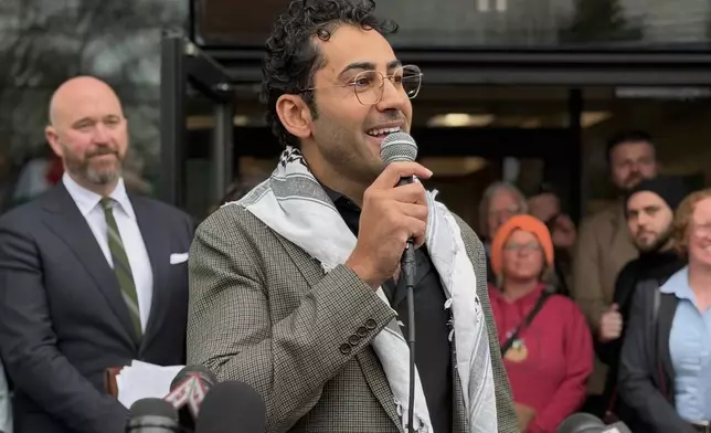 Mohsen Mahdawi speaks outside the courthouse after a judge released the Palestinian student activist on Wednesday, April 30, 2025 in Burlington, Vt. (AP Photo/Amanda Swinhart)