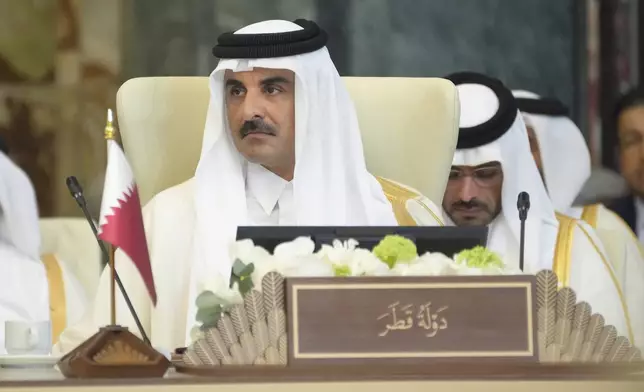 Emir of Qatar Sheikh Tamim bin Hamad Al Thani attends the 34th Arab League summit, in Baghdad, Iraq, Saturday, May 17, 2025. (AP Photo/Hadi Mizban)