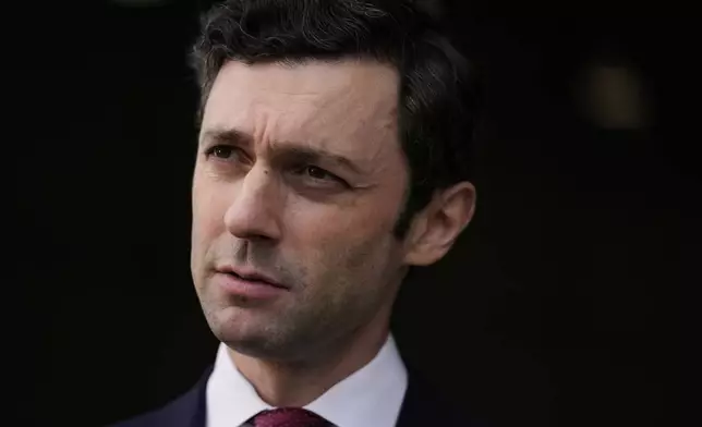 Sen. Jon Ossoff, D-Ga., speaks during an interview at Dobbins Air Reserve Base, Saturday, April 26, 2025, in Marietta, Ga. (AP Photo/Brynn Anderson)
