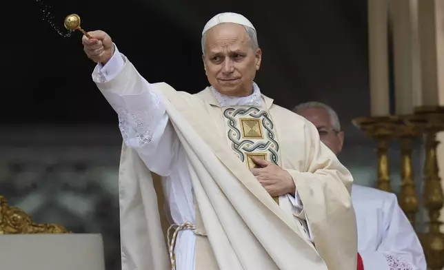 Pope Leo XIV's holds Mass during the formal inauguration of his pontificate in St. Peter's Square attended by heads of state, royalty and ordinary faithful, Sunday, May 18, 2025. (AP Photo/Alessandra Tarantino)