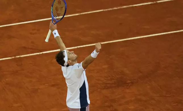 Norway's Casper Ruud reacts after winning the Madrid Open tennis final against Britain's Jack Draper in Madrid, Spain, Sunday, May 4, 2025. (AP Photo/Manu Fernandez)
