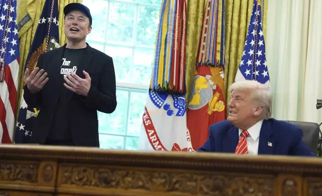 Elon Musk speaks during a news conference with President Donald Trump in the Oval Office of the White House, Friday, May 30, 2025, in Washington. (AP Photo/Evan Vucci)