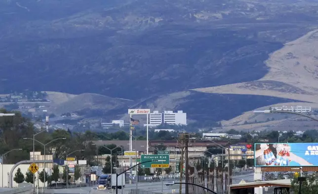 FILE - A view of on U.S. Interstate 80 in Sparks, Nev., Aug. 6, 2017. (AP Photo/Scott Sonner, File)