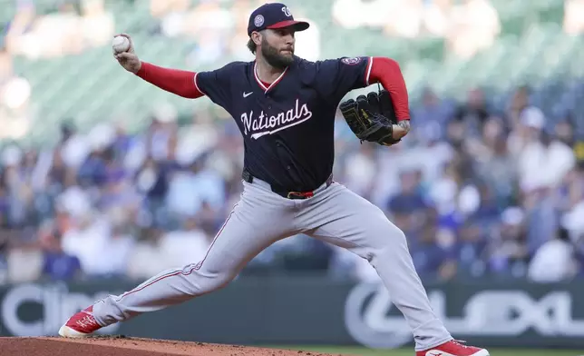 Washington Nationals starting pitcher Trevor Williams throws during the first inning of a baseball game against the Seattle Mariners, Wednesday, May 28, 2025, in Seattle. (AP Photo/Ryan Sun)