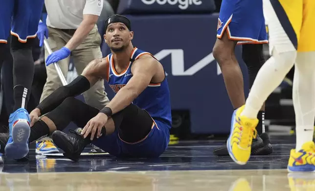 New York Knicks guard Josh Hart (3) looks up from the floor after his sixth foul during the second half of Game 4 of the Eastern Conference finals of the NBA basketball playoffs against the Indiana Pacers in Indianapolis, Tuesday, May 27, 2025. (AP Photo/Michael Conroy)