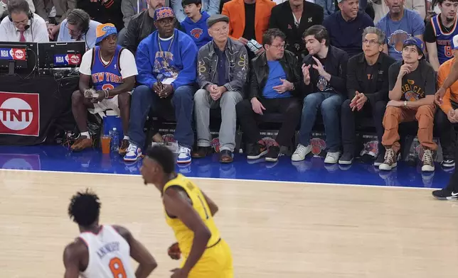 From left, Tracy Morgan, Bill Murray, third from left, Michael J. Fox, Ben Stiller, second from right, and Timothee Chalamet watch play between the New York Knicks and the Indiana Pacers during the first quarter of Game 2 of the NBA basketball Eastern Conference final, Friday, May 23, 2025, in New York. (AP Photo/Frank Franklin II)