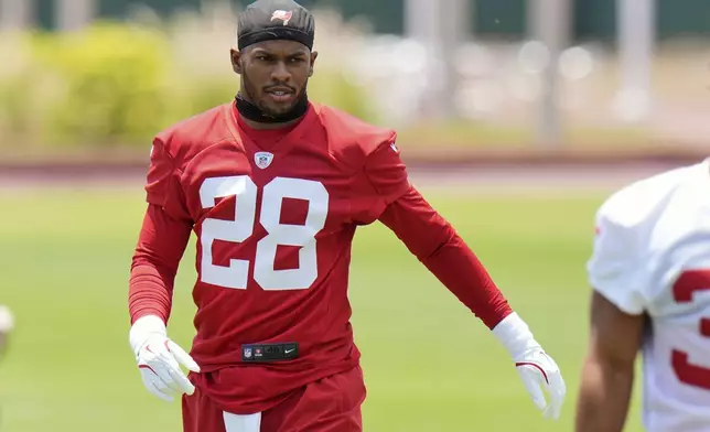 Tampa Bay Buccaneers safety Shilo Sanders works out during the NFL football team's rookie minicamp Friday, May 9, 2025, in Tampa, Fla. (AP Photo/Chris O'Meara)