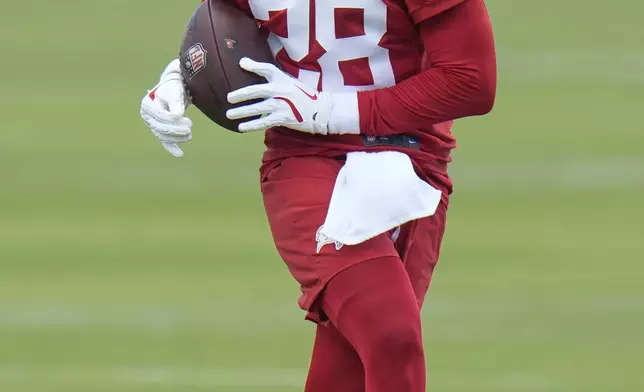 Tampa Bay Buccaneers safety Shilo Sanders catches the ball during the NFL football team's rookie minicamp Friday, May 9, 2025, in Tampa, Fla. (AP Photo/Chris O'Meara)