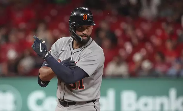 Detroit Tigers' Riley Greene celebrates after hitting an RBI double during the ninth inning of a baseball game against the St. Louis Cardinals Tuesday, May 20, 2025, in St. Louis. (AP Photo/Jeff Roberson)