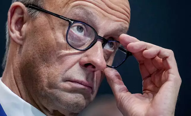 FILE - Friedrich Merz, CDU candidate for chancellor and CDU federal chairman, attends the 37th federal party conference in Berlin, Germany, Feb. 3, 2025. (AP Photo/Ebrahim Noroozi)