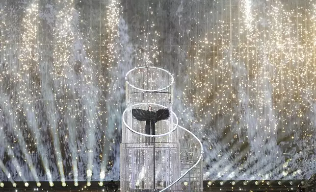 Yuval Raphael from Israel performs the song "New Day Will Rise" during the dress rehearsal for the second semi-final of the 69th Eurovision Song Contest, in Basel, Switzerland, Wednesday, May 14, 2025. (AP Photo/Martin Meissner)