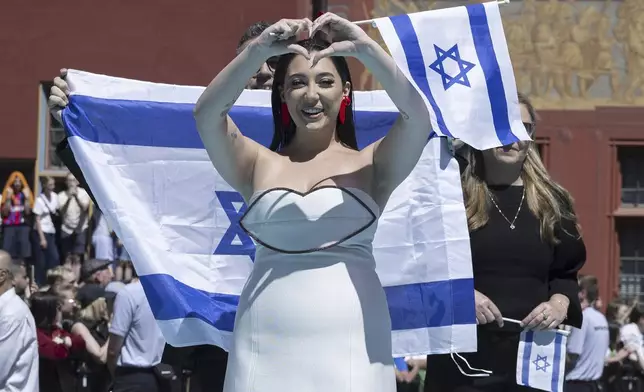 Israel's Yuval Raphael poses for a photo, during the opening ceremony of the 69th Eurovision Song Contest, in Basel, Switzerland, Sunday, May 11, 2025. (Peter Schneider/Keystone via AP)