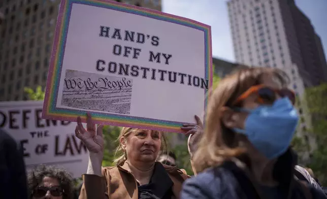 People take part in a rally for the Rule of Law on May Day, Thursday, May 1, 2025, in New York. (AP Photo/Adam Gray)