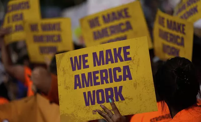 Demonstrators gather during a May Day protest at the Capitol, Thursday, May 1, 2025, in Phoenix. (AP Photo/Matt York)