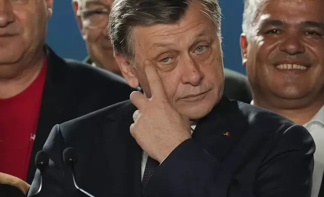 Presidential candidate Crin Antonescu attends a meeting with supporters after polls closed for the first round of the country's presidential election redo in Bucharest, Romania, Sunday, May 4, 2025. (AP Photo/Vadim Ghirda)
