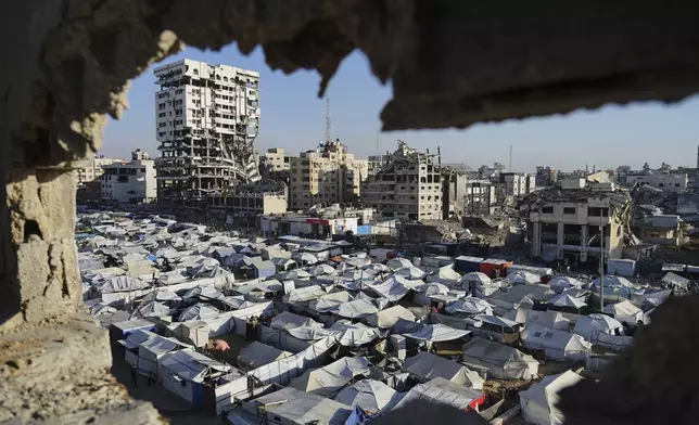 A makeshift tent camp for displaced Palestinians stretches across Gaza City on Tuesday, May 6, 2025. (AP Photo/Jehad Alshrafi)
