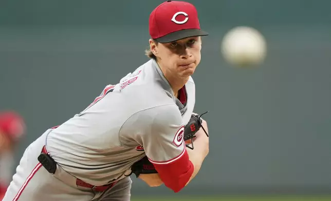 Cincinnati Reds starting pitcher Brady Singer throws during the first inning of a baseball game against the Kansas City Royals, Tuesday, May 27, 2025, in Kansas City, Mo. (AP Photo/Charlie Riedel)