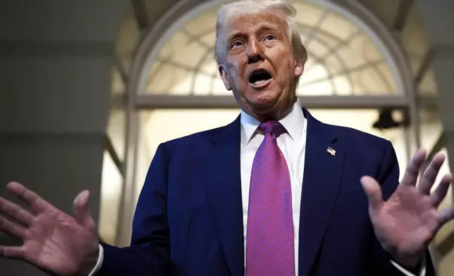 President Donald Trump speaks to reporters after departing a House Republican conference meeting, Tuesday, May 20, 2025, at the U.S. Capitol in Washington. (AP Photo/Julia Demaree Nikhinson)