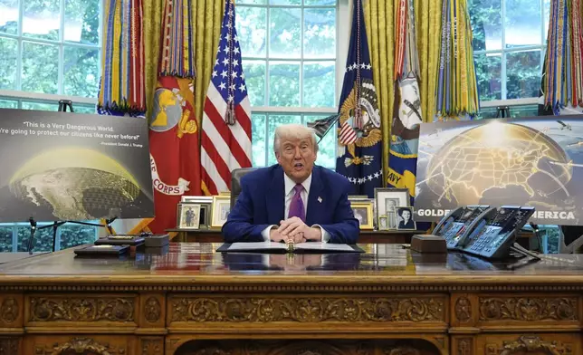 President Donald Trump speaks in the Oval Office of the White House, Tuesday, May 20, 2025, in Washington. (AP Photo/Alex Brandon)