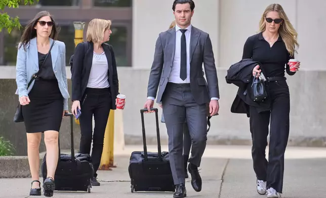 Dillon Dube, one of five hockey players charged with sexual assault, arrives at the courthouse in London, Ontario, Thursday, May 8, 2025. (Geoff Robins/The Canadian Press via AP)