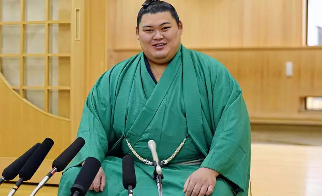 Onosato speaks during an interview with media members at his sumo training facility after winning a sumo wrestling tournament in Ami, northeast of Tokyo, Monday, May 26, 2025. (Yuya Shino/Kyodo News via AP)