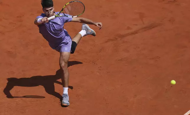 Spain's Carlos Alcaraz in action against Serbia's Dusan Lajovic during the Italian Open tennis tournament in Rome, Friday May 9, 2025. (Alfredo Falcone/LaPresse via AP)