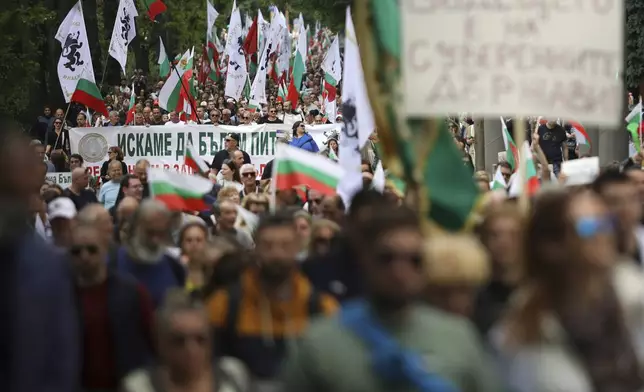 Thousands Bulgarians took on the streets of the capital, Sofia, and other major cities on Saturday to protest government plans to adopt the euro and to demand a referendum on the issue. Sofia, Saturday, May 31, 2025. (AP Photo/Valentina Petrova)