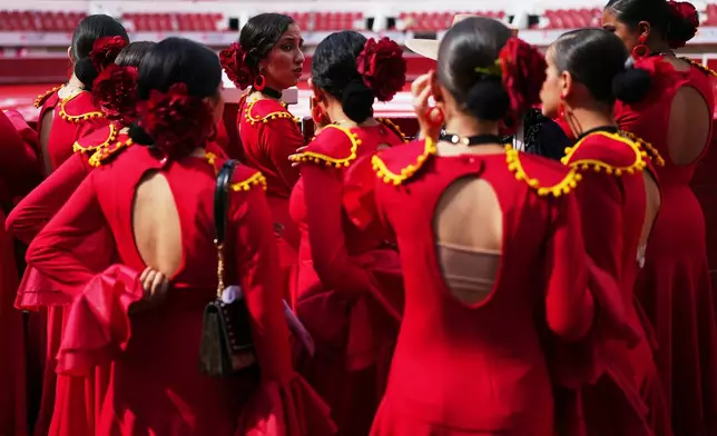 Women in traditional Spanish garb gather before a bullfight in Aguascalientes, Mexico, Sunday, April 27, 2025. (AP Photo/Eduardo Verdugo)