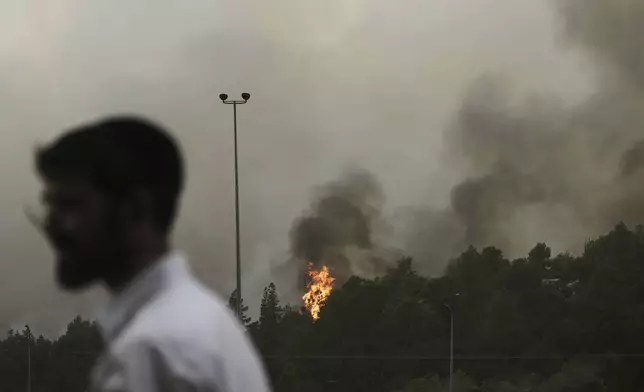 A forest fire burns near Jerusalem, Wednesday, April 30, 2025. (AP Photo/Mahmoud Illean)