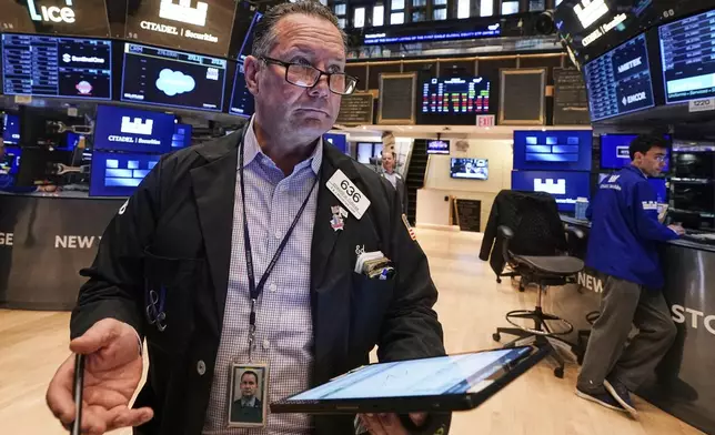 Trader Edward Curran works on the floor of the New York Stock Exchange, Thursday, May 29, 2025. (AP Photo/Richard Drew)