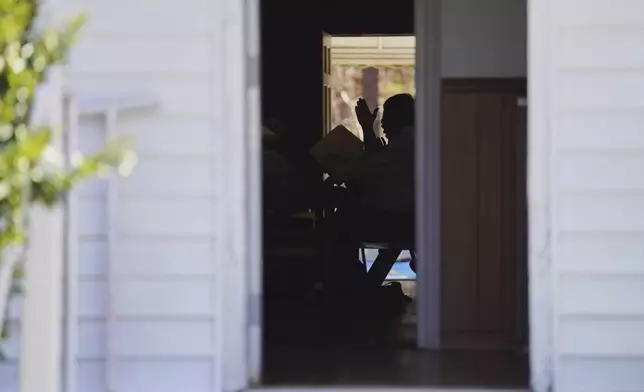 Rodney Ivey keeps time while singing from the tenor section at a Sacred Harp singing event at Holly Springs Primitive Baptist Church in Bremen, Ga., on Sunday, March 23, 2025. (AP Photo/Jessie Wardarski)