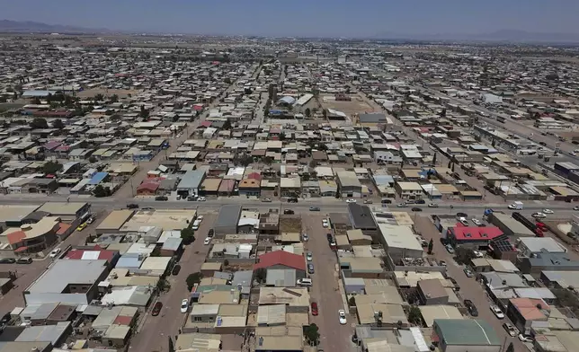 CORRECTS TO REMOVE THAT VIEW IS OF MENNONITE HOMES AND CROPS - An aerial view of Cuauhtemoc, Mexico, Thursday, May 1, 2025. (AP Photo/Martin Silva Rey)