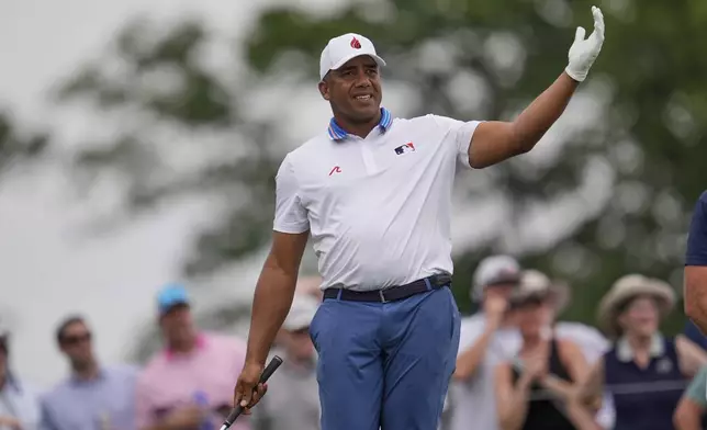 Jhonattan Vegas, of Venezuela, watches his tee shot on the 17th hole during the second round of the PGA Championship golf tournament at the Quail Hollow Club, Friday, May 16, 2025, in Charlotte, N.C. (AP Photo/George Walker IV)