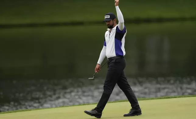 Matthieu Pavon, of France, reacts on the 17th hole during the second round of the PGA Championship golf tournament at the Quail Hollow Club, Friday, May 16, 2025, in Charlotte, N.C. (AP Photo/Matt York)