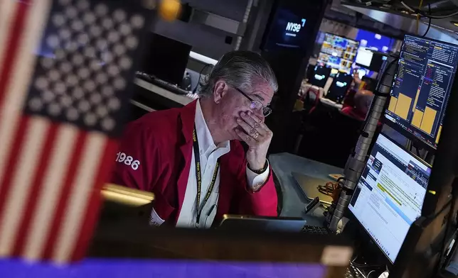 FILE - Trader Daniel Kryger works on the floor of the New York Stock Exchange on May 5, 2025. (AP Photo/Richard Drew, File)