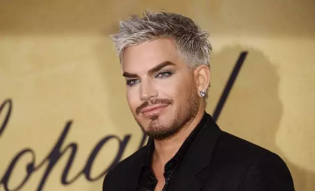 Adam Lambert poses for photographers upon arrival at the amfAR Cinema Against AIDS benefit at the Hotel du Cap-Eden-Roc, during the 78th Cannes international film festival, Cap d'Antibes, southern France, Thursday, May 22, 2025. (Photo by Joel C Ryan/Invision/AP)