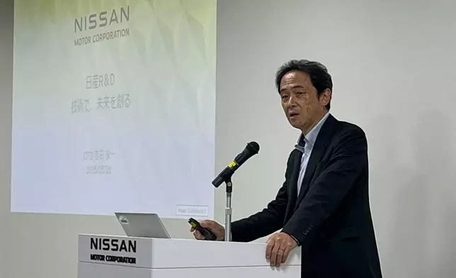 Nissan Chief Technology Officer Eiichi Akashi talks to reporters about their next-generation e-Power technology at the company’s Grandrive facility in Yokosuka, Japan, Monday, May 26, 2025. (AP Photo/Yuri Kageyama)