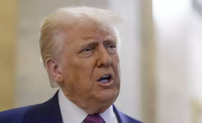 President Donald Trump speaks to reporters as he arrives for a meeting with the House Republican Conference at the Capitol, Tuesday, May 20, 2025, in Washington. (AP Photo/Rod Lamkey, Jr.)