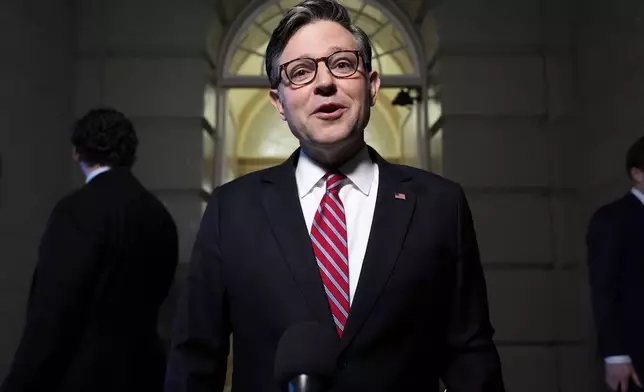 Speaker of the House Mike Johnson, R-La., speaks to reporters before a House Republican conference meeting, Tuesday, May 20, 2025, at the U.S. Capitol in Washington. (AP Photo/Julia Demaree Nikhinson)