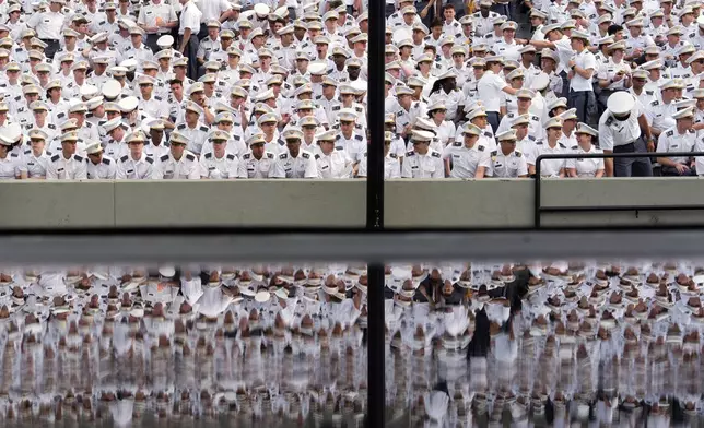 Cadets gather ahead of commencement ceremonies for the United States Military Academy in West Point, N.Y., Saturday, May 24, 2025. (AP Photo/Adam Gray)