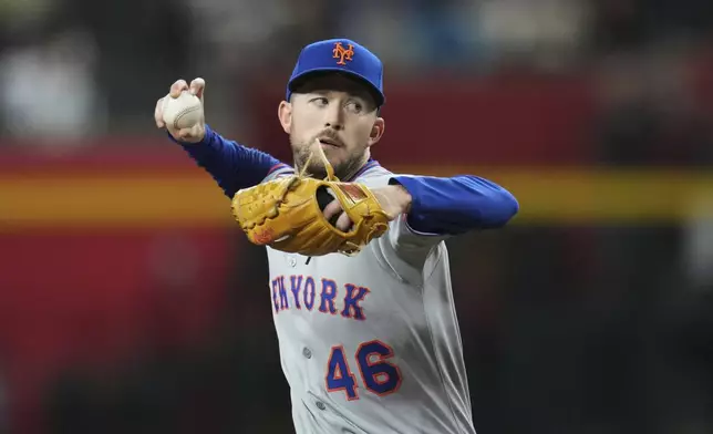New York Mets starting pitcher Griffin Canning throws against the Arizona Diamondbacks during the first inning of a baseball game Monday, May 5, 2025, in Phoenix. (AP Photo/Ross D. Franklin)