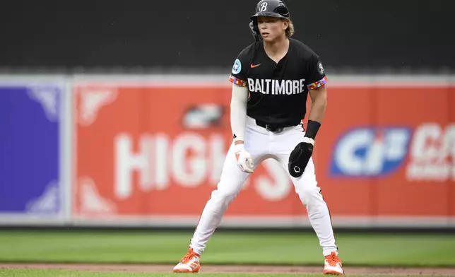 Baltimore Orioles' Jackson Holliday takes a lead from first base during the first inning of a baseball game against the Chicago White Sox, Friday, May 30, 2025, in Baltimore. (AP Photo/Nick Wass)