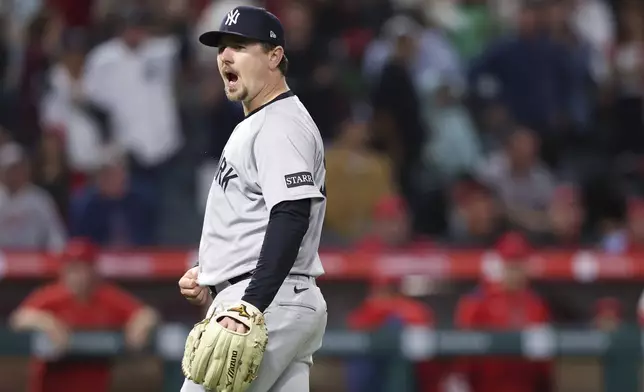 New York Yankees pitcher Mark Leiter Jr. reacts after the final out during the ninth inning of a baseball game against the Los Angeles Angels in Anaheim, Calif., Wednesday, May 28, 2025. (AP Photo/Jessie Alcheh)